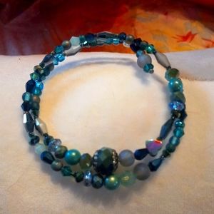 Pretty Czech beaded bracelet with crystals on memory wire in shades of turquoise